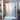 DreamLine Unidoor 55-56 in. W x 72 in. H Frameless Hinged Shower Door with Shelves, Clear Glass - BNGBath